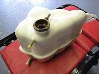 Click image for larger version. 

Name:	CrackedHeaderTank.JPG 
Views:	5194 
Size:	132.0 KB 
ID:	7266